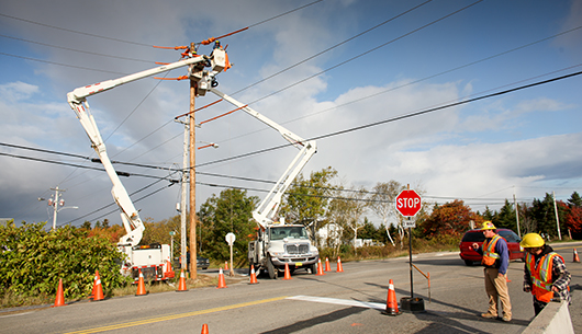 crews-in-hard-hats-bucket-arms